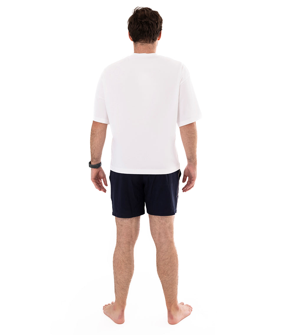 Navy Man wearing navy shorts on a white background