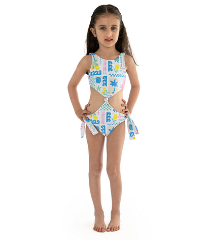 Capri White Young girl wearing a colorful swimsuit with a white background