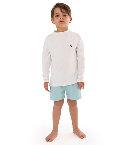 White boy wearing white rashguard dryfit with aqua blue shorts