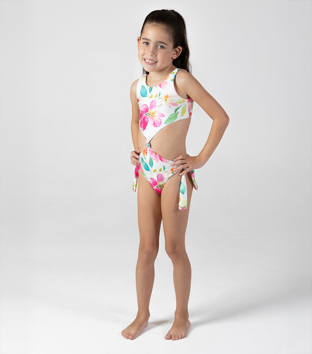 aquarella flowers Young girl wearing a colorful floral swimsuit on a white background